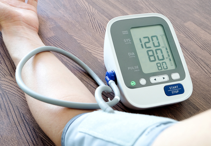 Digital blood pressure monitor displays systolic, diastolic blood pressure and pulse rate