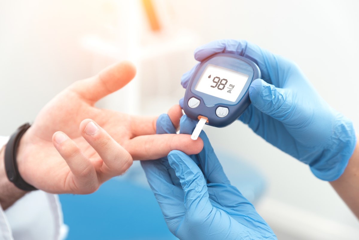 Measuring blood sugar - blood glucose, pricking in the finger and measuring