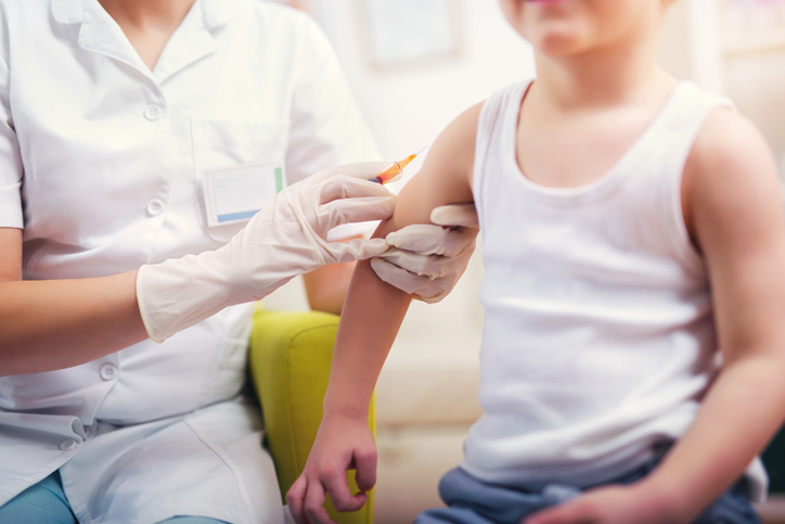 Vaccination - boy, doctor and vaccine