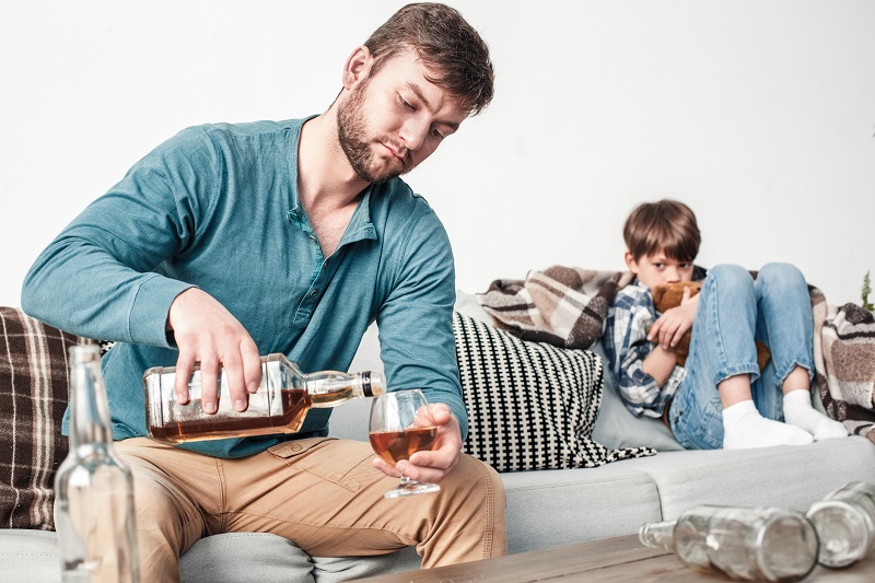 The father's addiction to alcohol. The children especially suffer from it.