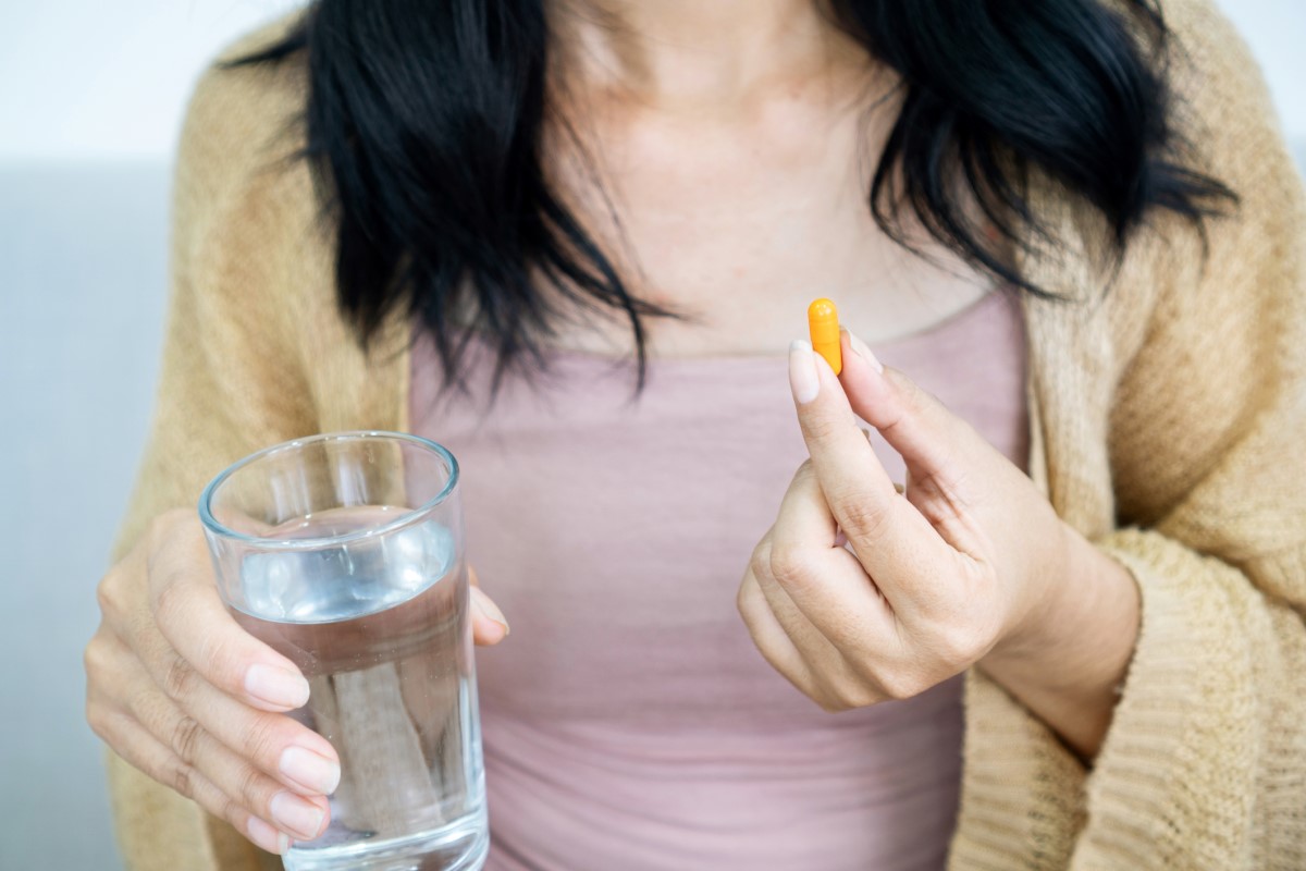 Medicine in the hands of a woman