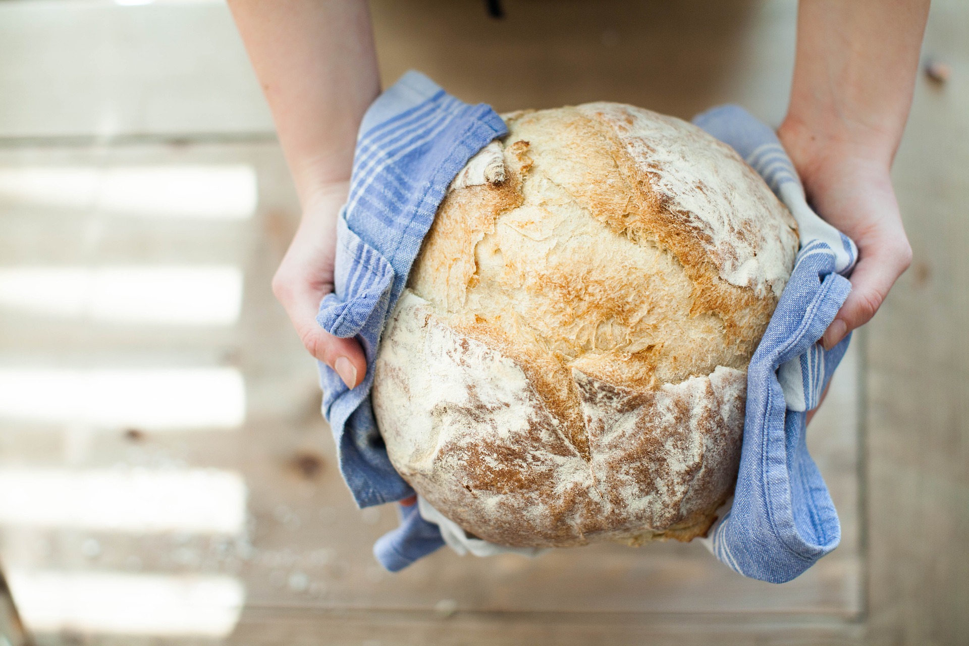 Person holding gluten-free bread