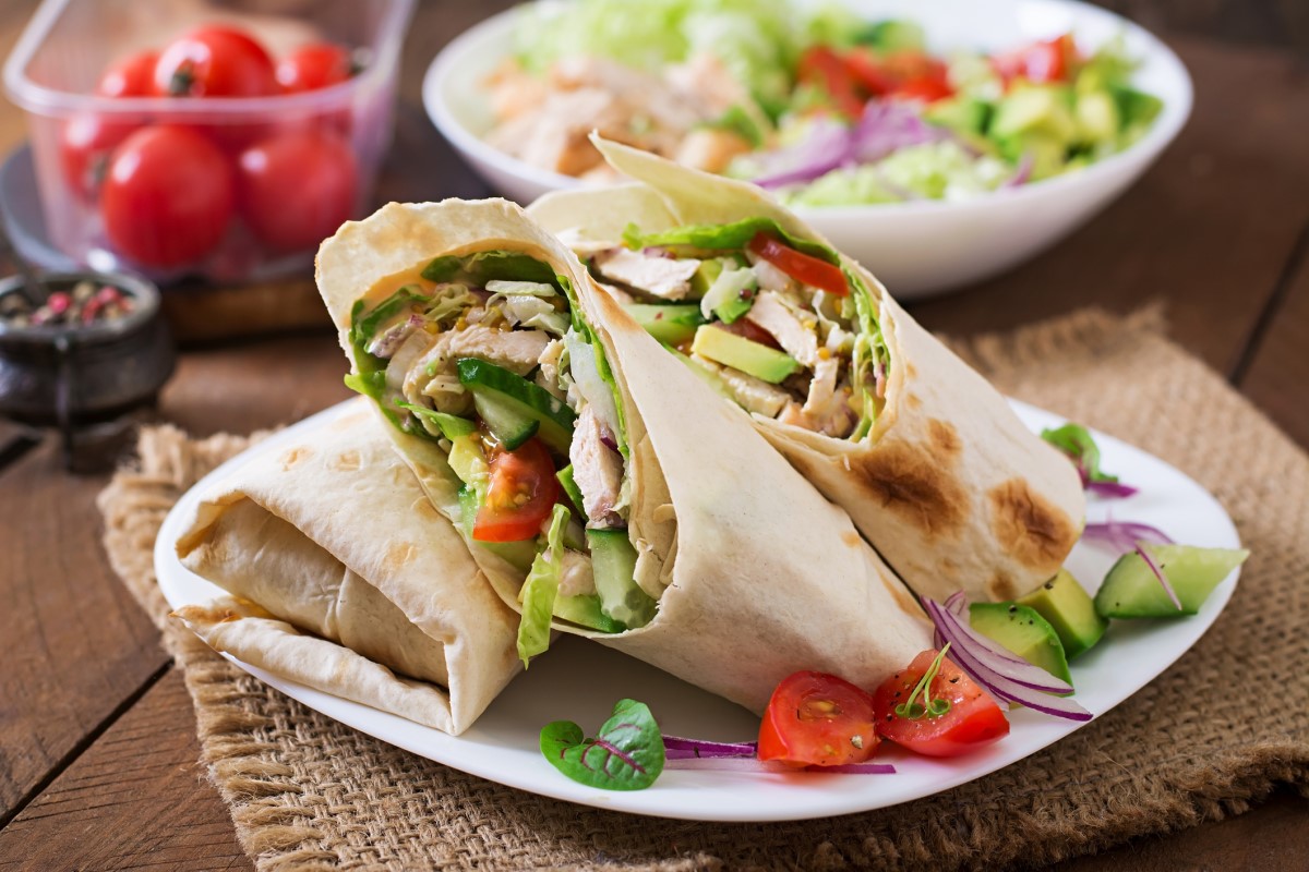 Whole wheat tortilla filled with lean chicken and fresh vegetables.