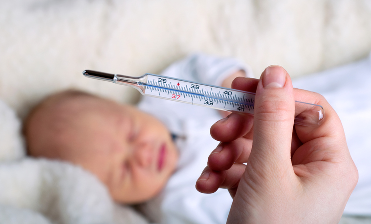 Measuring body temperature to a small child