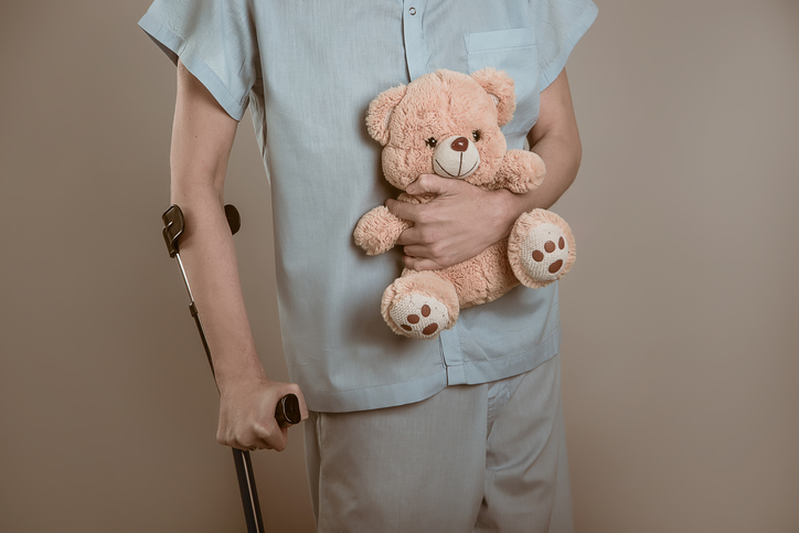 a man with hemorrhage and polio holding a copper