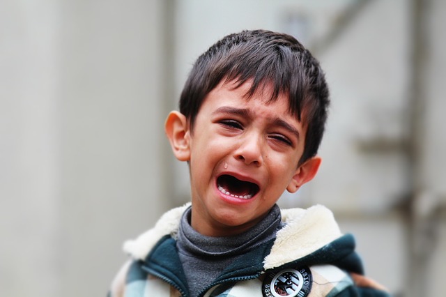 little boy crying, psychological stress