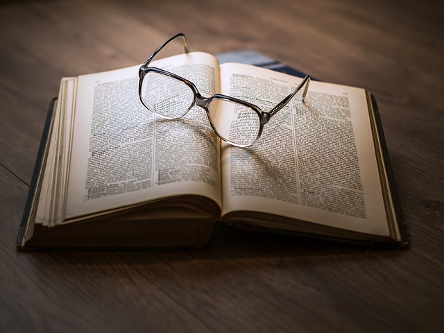 Glasses, book, impaired vision
