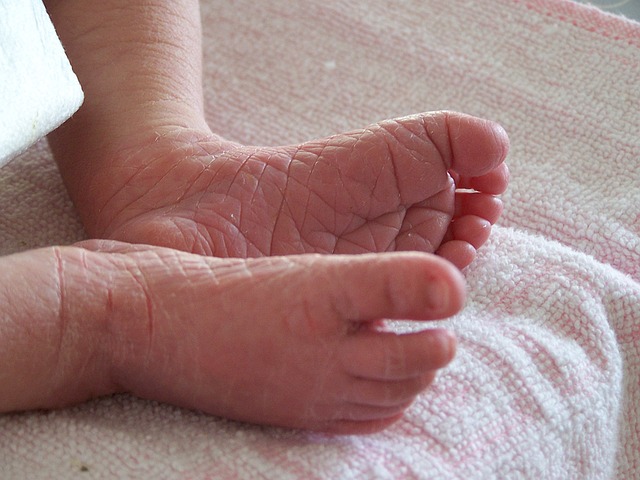 Dry skin on the foot of a newborn, infant