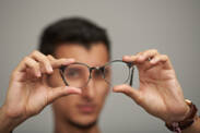 Myopia: The onset of myopia + how does impaired distance vision appear?